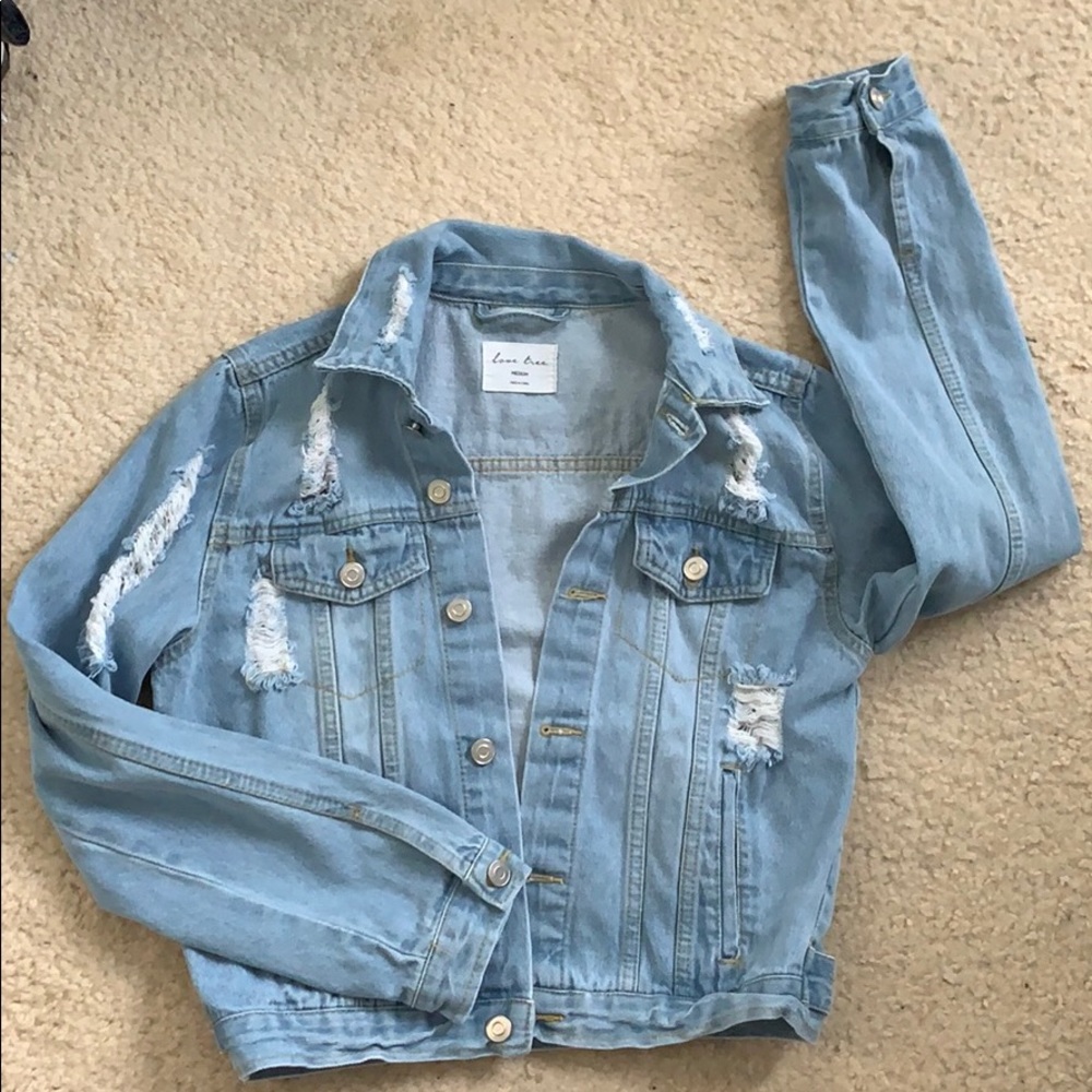 Light wash distressed jean jacket
